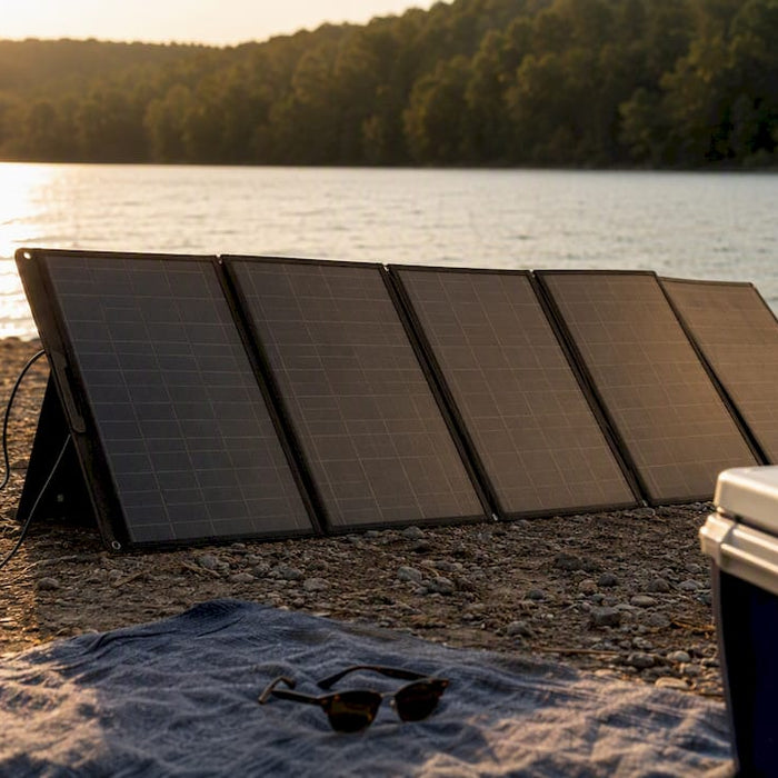 Portable solar panels connected to power station outdoors